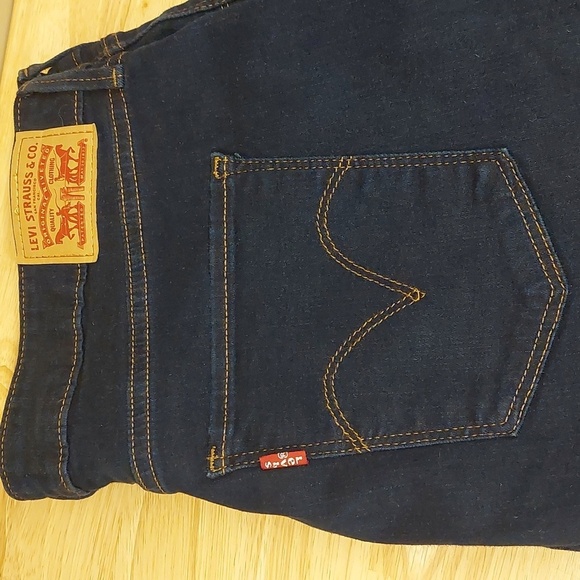 Levi’s Classic Mid Rise Skinny Jeans size 33 Dark wash Cotton Blend Casual - Picture 5 of 8